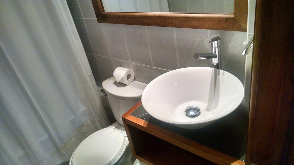 Hostal Buena Estancia Punta Arenas Quarto foto